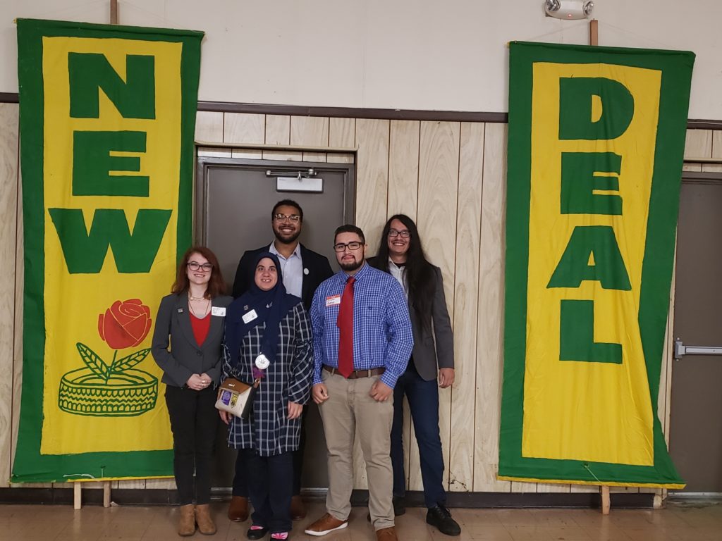 Mikal and progressive activists advocating for a Green New Deal.